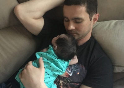Eric Moss and his baby daughter Aurora